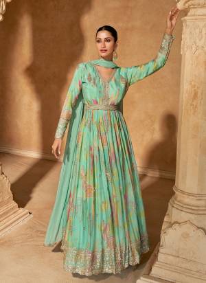 Garb These Party Wear Anarkali Suit in Fine Colored Pair With Dupatta.These Top Are Chinon And Dupatta Are Nazmin And Pair With Crepe Inner.Its Beautified With Designer Printed With Embroidery Work.