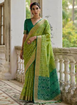 Looking These Festive Wear Saree in Fine Colored.These Saree And Blouse is Fabricated On Raw Silk.Its Beautified With Wevon Ikkat Designer.