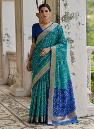 Looking These Festive Wear Saree in Fine Colored.These Saree And Blouse is Fabricated On Raw Silk.Its Beautified With Wevon Ikkat Designer.