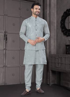 Looking These Party Wear Mans Wear Kutra Payjama With Jacket wearing this fashionable. Tailored Kurta Pajama With Koti On Viscose Fabriced With Designer Thread,Sequance Embroidery Work and fashioned with a banded collar for a dash of style.