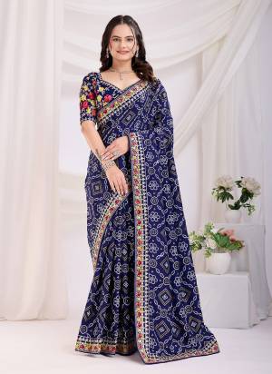 Garb These Fastival Saree in Fine Colored.These Saree Are Vichitra Silk And Blouse is Mono Banglori Silk Fabricated.Its Beautified With Designer Bandhani Printed, Embroidery Work Lace And Blouse.