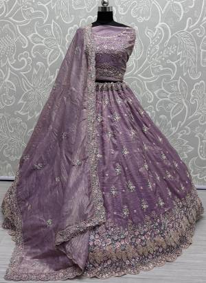 For A Fancy Designer Look,Grab These Lehenga Choli With Dupatta in Fine Colored.These Lehenga And Choli Are Silk And Dupatta Are Fabricated On Soft Net Pair.Its Beautified With Peacock Designer Dori,Sequance,Thread Embroidery,Hand Work.