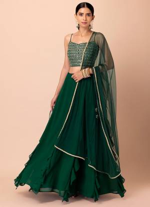 For A Designer Look,Grab These Lehenga Choli in Fine Colored.These Lehenga And Blouse Are Fabricated On Georgette Pair With Dupatta Are Soft Net.Its Beautified With Designer Sequance,Jari Embroidery Work.