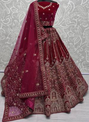 For A Fancy Designer Look,Grab These Lehenga Choli With Dupatta in Fine Colored.These Lehenga And Choli Are Velvet And Dupatta Are Fabricated On Soft Net & Velvet Pair.Its Beautified With Designer Mirror Hand Work,Fancy Dori,Jari Embroidery With Motif,Heavy Diamond Work.