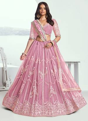 For A Different Look,Grab These Party Wear Designer Lehenga in All Over Pretty Colored Pair With Blouse And Dupatta.These Lehenga Choli And Dupatta is All Over Butterfly Net Base Fabric With Designer Thread Embroidery Work.