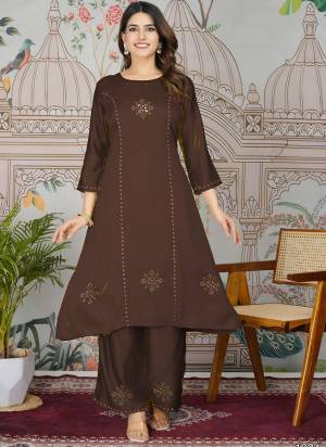 Attrective These Designer Top With Bottom In Fine Colored Pair.These Top And Bottom Are Fabricated On Gajji Silk Pair.Its Beautified With Designer Embroidery Work.