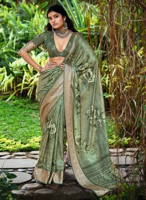 Attractive These Party Wear Saree in Fine Colored.These Saree And Blouse is Fabricated On Cotton Silk Pair.Its Beautified With Wevon Jari Border Designer With Digital Floral Printed.