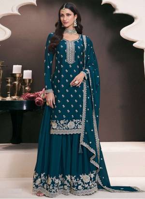 Garb These Designer Plazzo Suits in Fine Colored Pair With Dupatta.These Top Are Chinon And Dupatta Are Fabricated On Chinon Pair With Chinon Bottom.Its Beautified With Heavy Designer Embroidery Work