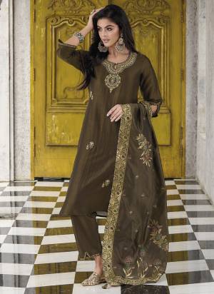 Garb These Beautiful Looking Readymade Suits With Dupatta.These Suit is Fabricated On Top Are Viscose Silk And Bottom Are Viscose Silk And Jacquard Silk Dupatta .Its Beautified With Designer Thread Embroidery,Hand Work,Wevon Dupatta.