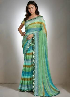 Garb These Party Wear Saree in Fine Colored.These Saree Are Chiffon And Blouse is Jari Brocade Fabricated.Its Beautified With Designer Lariya Printed With Mirror Cut Work.