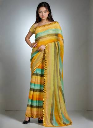 Garb These Party Wear Saree in Fine Colored.These Saree Are Chiffon And Blouse is Jari Brocade Fabricated.Its Beautified With Designer Lariya Printed With Mirror Cut Work.