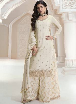 Looking These Party Wear Designer Sharara Suits in Fine Colored Pair With Dupatta.These Top Are Chinon And Dupatta Are Fabricated On Chinon Pair With Chinon Bottom.Its Beautified With Wevon Designer, Embroidery Work