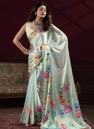 Attractive Look These Party Wear Saree in Fine Colored.These Saree Are Japan Satin Silk And Blouse is Japan Satin Silk Fabricated.Its Beautified With Designer Flower Digital Printed,Pearl Lace Border.