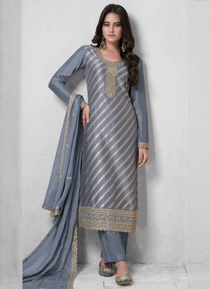  Looking These Party Wear Suit in Fine Colored Pair With Bottom And Dupatta.These Top Are Lotus Silk Jacquard And Dupatta Are Fabricated On Rangoli Georgette Pair With Santoon Bottom.Its Beautified With Wevon Jacquard Designer, Embroidery Work.