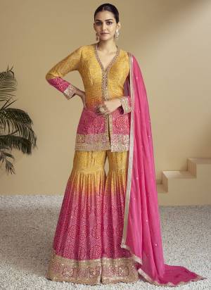Garb These Party Wear Plazzo Suit in Fine Colored Pair With Bottom And Dupatta.These Top Are Chinon And Dupatta Are Fabricated On Chinon Pair With Chinon Bottom.Its Beautified With Digital Bandhani Printed, Embroidery,Hand Work.
