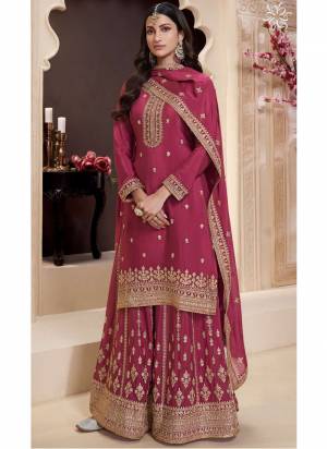  Looking These Party Wear Sharara Suit in Fine Colored Pair With Bottom And Dupatta.These Top Are Chinon And Dupatta Are Fabricated On Chinon Pair With Chinon Bottom.Its Beautified With Heavy Designer Embroidery Work.