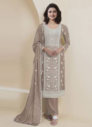 Garb These Designer Suit in Fine Colored Pair With Bottom And Dupatta.These Top Are Faux Georgette And Dupatta Are Fabricated On Faux Georgette Pair With Santoon Bottom.Its Beautified With Santoon Inner.Its Beautified With Designer Embroidery Work.