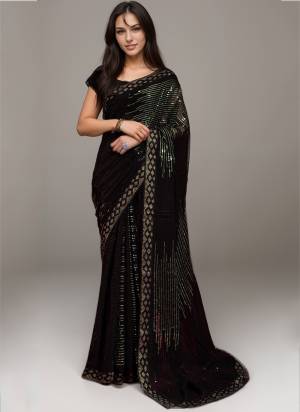 Looking These Party Wear Saree in Fine Colored.These Saree Are Georgette And Blouse is Banglori Fabricated.Its Beautified With Designer Sequance Embroidery Work.