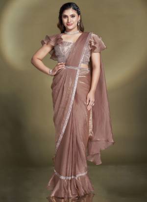 Look Attrective These Designer Party Wear Ready To Wear Saree With Blouse in Fine Colored.These Saree Are Two Tone Satin Silk And Blouse Crepe is Fabricated.Its Beautified Solid,Desiger Sequance,Beads,Aari Hand Work And Belt.