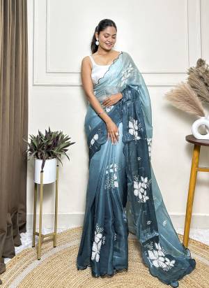 Attrective These Party Wear Saree in Fine Dual Shaded Colored.These Saree Are Jimmy Choo And Blouse is Satin Silk Fabricated.Its Beautified With Pedding Color Printed With Designer Sequance Embroidery Work.