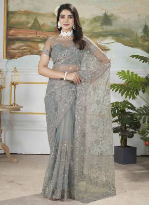 Garb These Party Wear Saree in Fine Colored.These Saree Are Butterfly Net And Blouse is Butterfly Net Fabricated.Its Beautified With Designer Duble Sequance,Thread Embroidery,Cut Work.