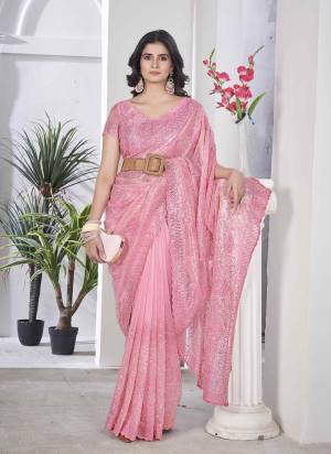 Looking These Party Wear Saree in Fine Colored.These Saree Are Tissue Net And Blouse is Tissue Net Fabricated.Its Beautified With Designer Sequance,Multy Thread Embroidery,Cut Work.