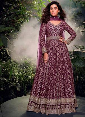 Garb These Party Wear Anarkali Suit in Fine Colored Pair With Dupatta.These Top Are Jacquard Silk And Dupatta Are Net And Pair With Crepe Inner.Its Beautified With Heavy Wevon Jacquard Designer With Embroidery Work.