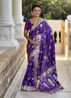 Garb These Party Wear Saree in Fine Colored.These Saree And Blouse is Fabricated On Dolla Silk.Its Beautified With Weaving Meenakari Designer.
