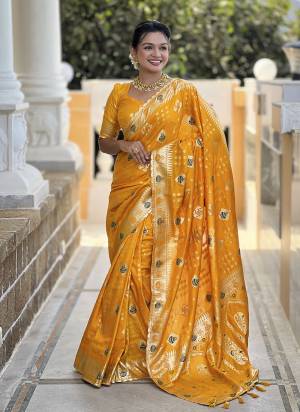 Garb These Party Wear Saree in Fine Colored.These Saree And Blouse is Fabricated On Dolla Silk.Its Beautified With Weaving Meenakari Designer.