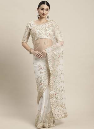 Attrective These Party Wear Saree in Fine Colored.These Saree Are Soft Net And Blouse is Soft Net Fabricated.Its Beautified With Designer Embroidery Work.