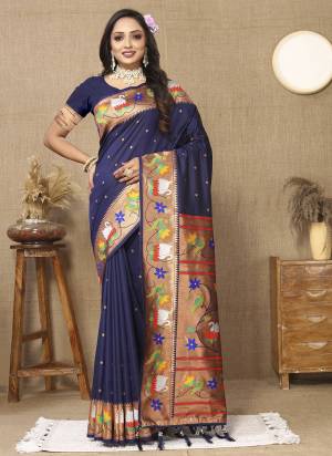 Garb These Party Wear Paithani Saree in Fine Colored.These Saree And Blouse is Fabricated On Paithani Silk.Its Beautified With Weaving Meenakari Paithani Designer.