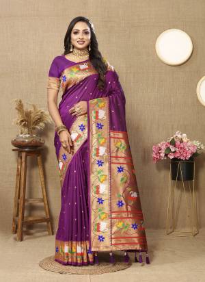 Garb These Party Wear Paithani Saree in Fine Colored.These Saree And Blouse is Fabricated On Paithani Silk.Its Beautified With Weaving Meenakari Paithani Designer.
