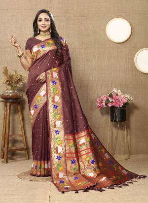 Garb These Party Wear Paithani Saree in Fine Colored.These Saree And Blouse is Fabricated On Paithani Silk.Its Beautified With Weaving Meenakari Paithani Designer.
