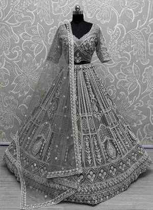 For A Fancy Designer Look,Grab These Lehenga Choli With Dupatta in Fine Colored.These Lehenga Are Net And Choli Are Net And Dupatta Are Fabricated On Soft Net Pair.Its Beautified With Heavy Designer Sequance Embroidery,Hand Work.