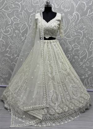 For A Fancy Designer Look,Grab These Lehenga Choli With Dupatta in Fine Colored.These Lehenga Are Net And Choli Are Net And Dupatta Are Fabricated On Soft Net Pair.Its Beautified With Heavy Designer Sequance Embroidery,Hand Work.
