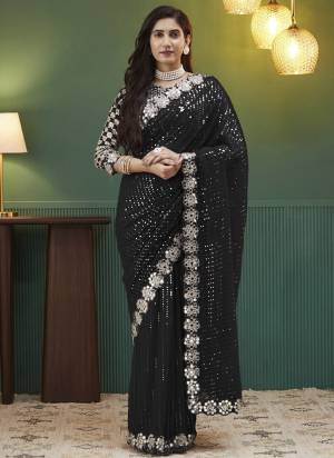 Attractive These Party Wear Saree in Fine Colored.These Saree Are Georgette And Blouse is Fabricated On Georgette.Its Beautified With Designer Sequance,Mirror Embroidery Work.