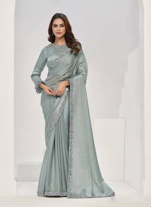 Look Attrective These Designer Party Wear Saree in Fine Colored.These Saree Are Crepe Satin Silk And Blouse Satin Silk is Fabricated.Its Beautified Desiger Embroidery Work.
