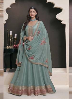Garb These Party Wear Anarkali Suit in Fine Colored Pair With Dupatta.These Top Are Art Silk And Dupatta Are Georgette And Pair With Dull Santoon Bottom.Its Beautified With Designer Embroidery Work.