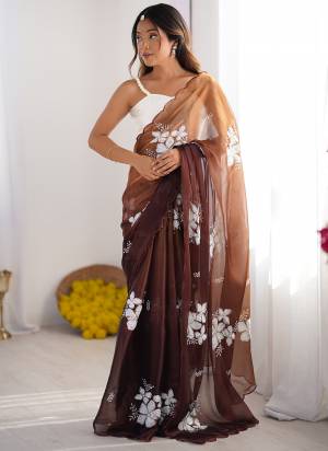 Garb These Party Wear Saree in Fine Padding Colored.These Saree Are Jimmy Choo And Blouse is Ultra Satin Fabricated.Its Beautified With Designer Dual Sequance Embroidery Work.