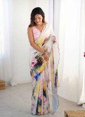 Garb These Party Wear Saree in Fine Colored.These Saree And Blouse is Chinon Fabricated.Its Beautified With Designer Digital Printed With Mirror Cut Work.