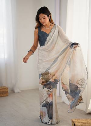Looking These Party Wear Saree in Fine Colored.These Saree And Blouse is Chinon Fabricated.Its Beautified With Designer Digital Printed With Mirror Cut Work.