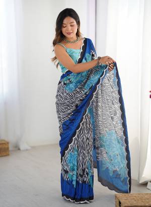 Attrective Looking These Party Wear Saree in Fine Colored.These Saree And Blouse is Chinon Fabricated.Its Beautified With Designer Digital Printed With Mirror Cut Work.