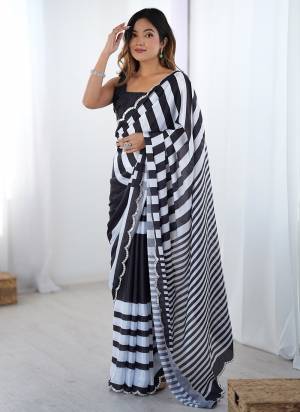 Attrective Looking These Party Wear Saree in Fine Colored.These Saree And Blouse is Chinon Fabricated.Its Beautified With Designer Digital Printed With Mirror Cut Work.