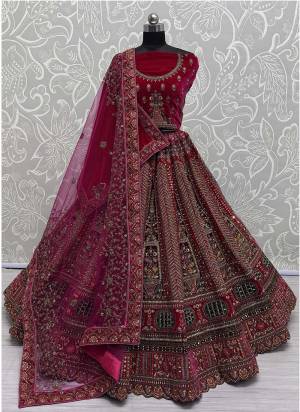 For A Fancy Designer Look,Grab These Lehenga Choli With 2 Dupatta in Fine Colored.These Lehenga And Choli Are Velvet And Dupatta Are Fabricated On Soft Net & Velvet Pair.Its Beautified With Designer Sequance,Multy Thread,Dori,Patch,Hand Mirrar Embroidery With Diamond Work. 