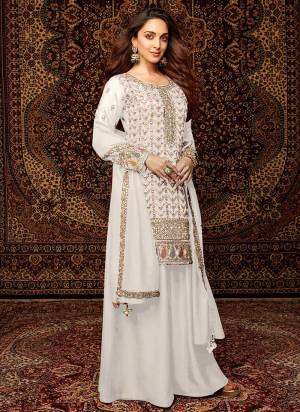 Looking These Designer Plazzo Suit in Fine Colored Pair With Bottom And Dupatta.These Top Are Chinon And Dupatta Are Fabricated On Chinon Pair With Santoon Bottom.Its Beautified With Santoon Inner.Its Beautified With Designer Embroidery Work.