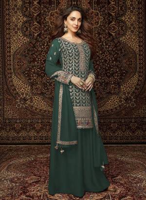 Looking These Designer Plazzo Suit in Fine Colored Pair With Bottom And Dupatta.These Top Are Chinon And Dupatta Are Fabricated On Chinon Pair With Santoon Bottom.Its Beautified With Santoon Inner.Its Beautified With Designer Embroidery Work.