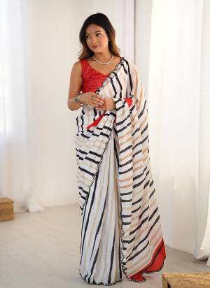  Looking These Party Wear Saree in Fine Colored.These Saree And Blouse is Chinon Fabricated.Its Beautified With Designer Digital Printed With Mirror Cut Work.