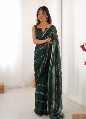 Looking These Party Wear Saree in Fine Colored.These Saree Are Sitara Chiffon And Blouse is Mono Banglori Fabricated.Its Beautified With Designer Beads Moti,Val Sequance Embroidery Work With Codding Lace Border.