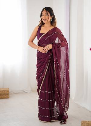 Looking These Party Wear Saree in Fine Colored.These Saree Are Sitara Chiffon And Blouse is Mono Banglori Fabricated.Its Beautified With Designer Beads Moti,Val Sequance Embroidery Work With Codding Lace Border.