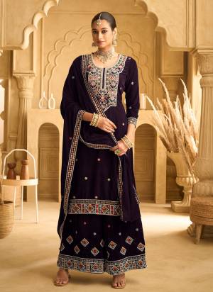 Garb These Party Wear Designer Plazzo Suits in Fine Colored Pair With Dupatta.These Top Are Velvet And Dupatta Are Fabricated On Velvet Pair With Velvet Bottom.Its Beautified With Designer Embroidery Work.